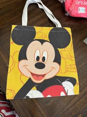Disney Mickey Mouse canvas tote bag with yellow background